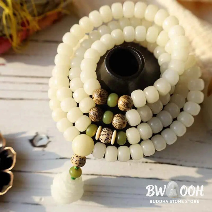 BWOOOH White Jade Bodhi Lotus Mala Harmony Necklace Bracelet with 108 naturally pale Bodhi seeds and a delicate lotus pendant, embodying purity and spiritual awakening for meditation and daily wear. - View 4