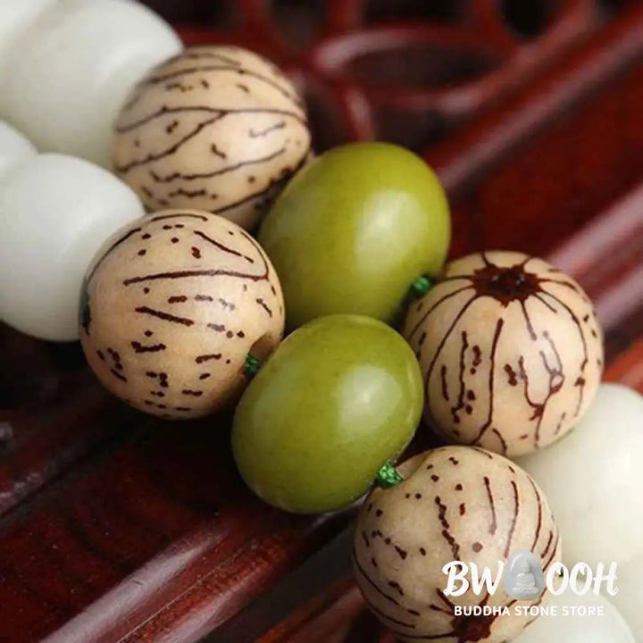 BWOOOH White Jade Bodhi Lotus Mala Harmony Necklace Bracelet with 108 naturally pale Bodhi seeds and a delicate lotus pendant, embodying purity and spiritual awakening for meditation and daily wear. - View 12