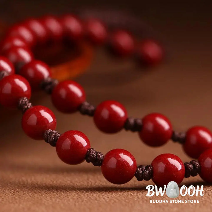 BWOOOH Year of the Dragon necklace: Glistening natural cinnabar beads, serene Hetian jade, and an ancient copper coin pendant. A powerful talisman invoking wealth, strength, and spiritual protection against ill fortune, imbued with auspicious Yang energy. - View 5