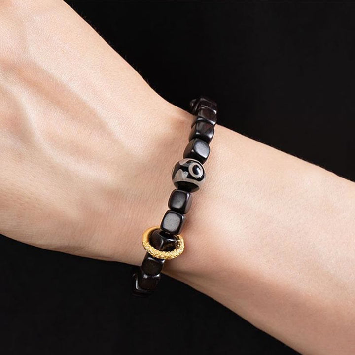 BWOOOH Tibetan Ebony Wood Dzi Bead Balance Calm Bracelet