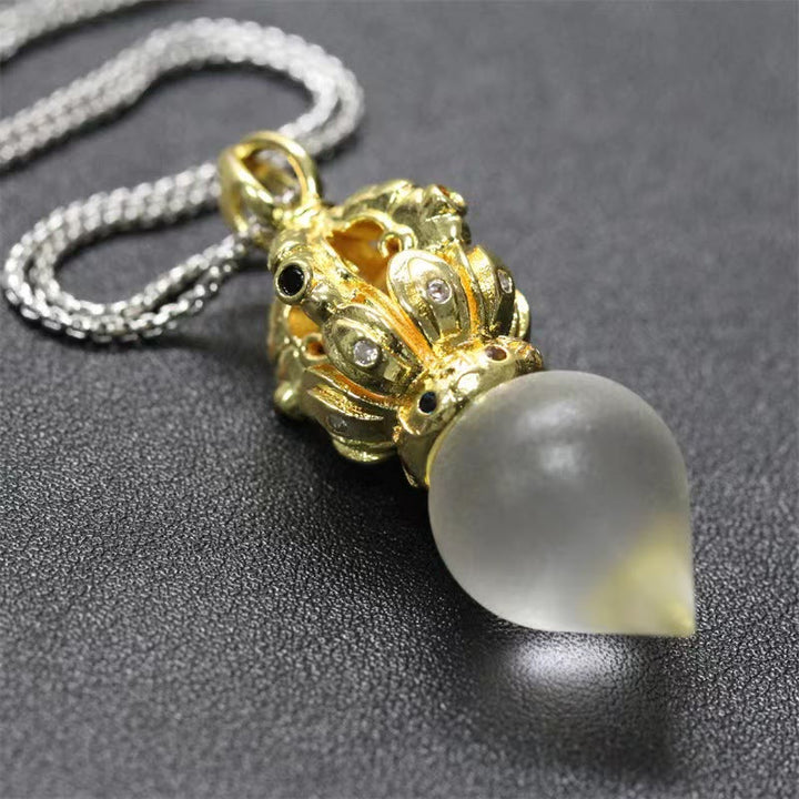 BWOOOH Tibetan Dorje Vajra 4 Prong Lotus Liuli Crystal Strength Necklace Pendant