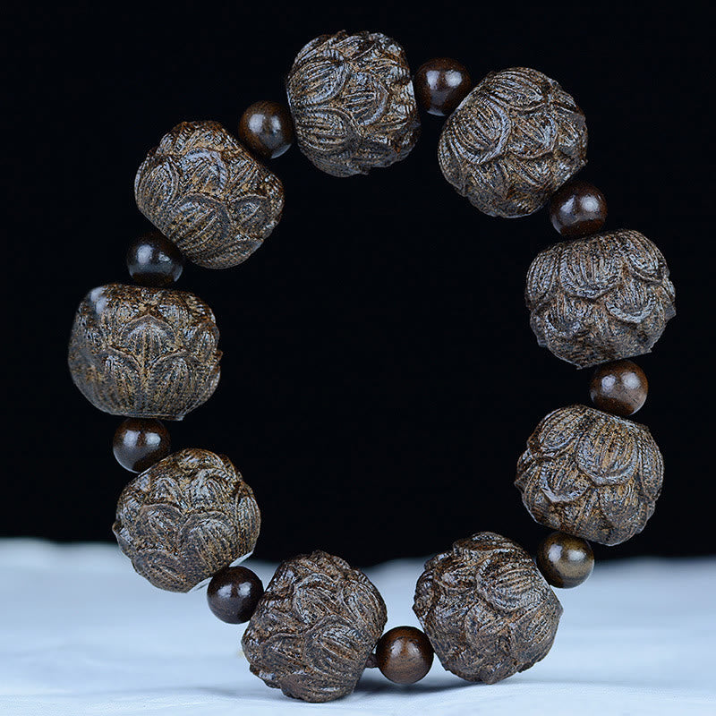 BWOOOH Ebony Wood Eighteen Arhats Lotus Dragon Engraved Balance Bracelet | spiritual healing bracelet