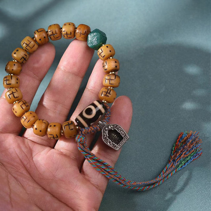 BWOOOH Natural Tibetan Camel Bone Swastika Dzi Bead Shankha Buddha Charm Kirtimukha Luck Protection Tassel Bracelet