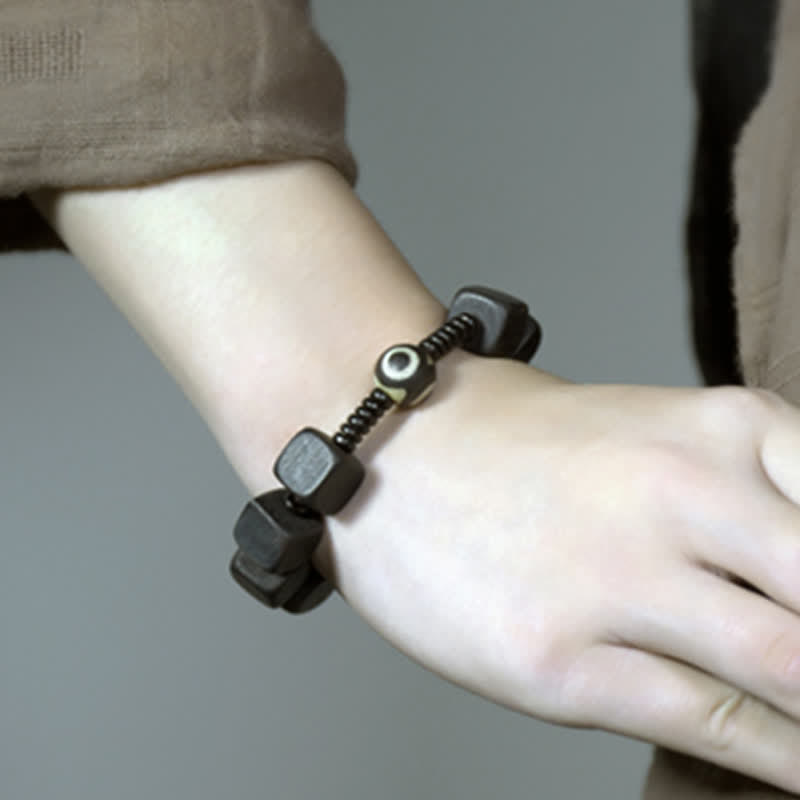 BWOOOH Tibetan Ebony Wood Dzi Bead Strength Bracelet  -  Ebony Tibetan bracelet for spiritual healing and mindful living