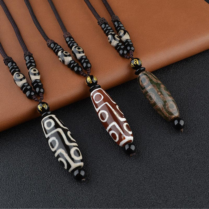 BWOOOH Nine-Eye Dzi Bead Wealth Protection Necklace — hand-painted Tibetan dzi bead 14×40mm with Black Onyx for wealth, protection &amp; all-wish fulfillment
