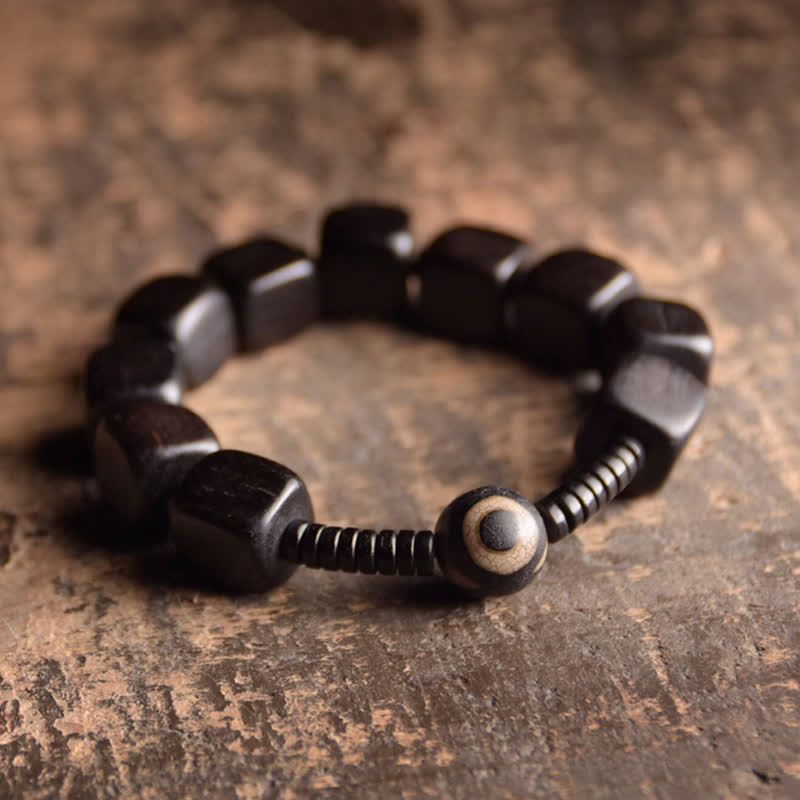 BWOOOH Tibetan Ebony Wood Dzi Bead Strength Bracelet  -  Ebony Tibetan bracelet for spiritual healing and mindful living