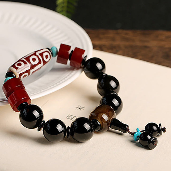 BWOOOH Tibetan Nine-Eye Dzi Bead Black Onyx Wealth Protection Bracelet