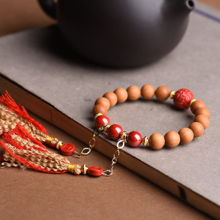 BWOOOH Tibetan Natural Peach Wood Cinnabar PiXiu Wealth Tassels Bracelet
