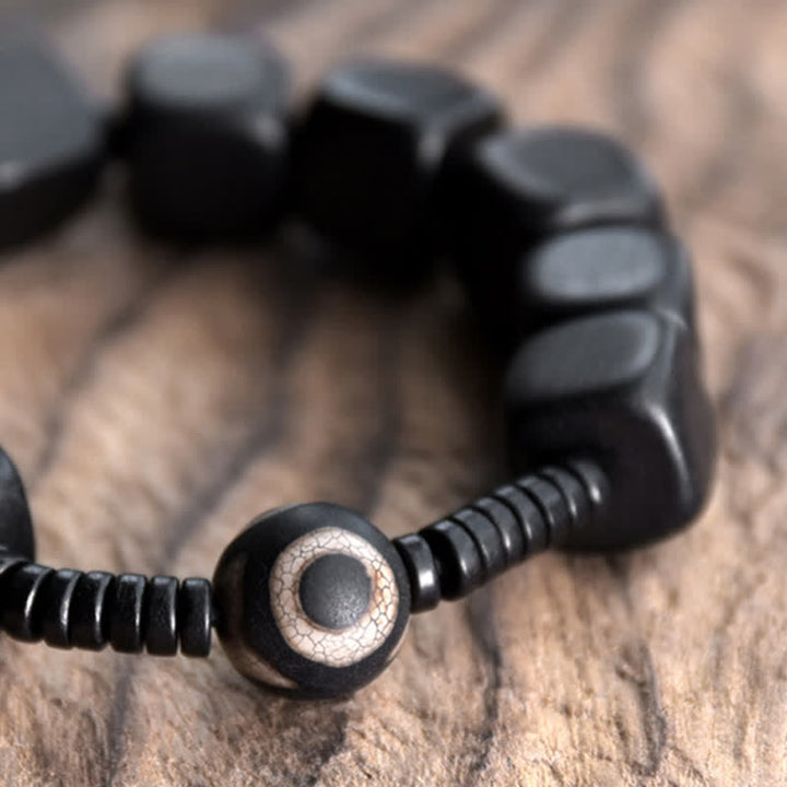 BWOOOH Tibetan Ebony Wood Dzi Bead Strength Bracelet  -  Ebony Tibetan bracelet for spiritual healing and mindful living
