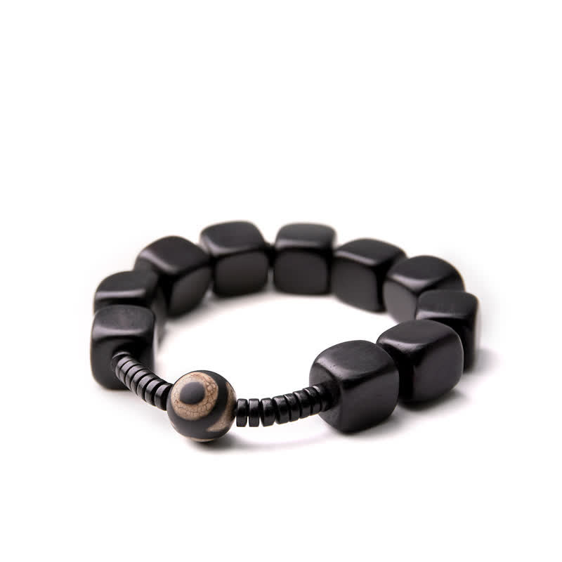 BWOOOH Tibetan Ebony Wood Dzi Bead Strength Bracelet  -  Ebony Tibetan bracelet for spiritual healing and mindful living
