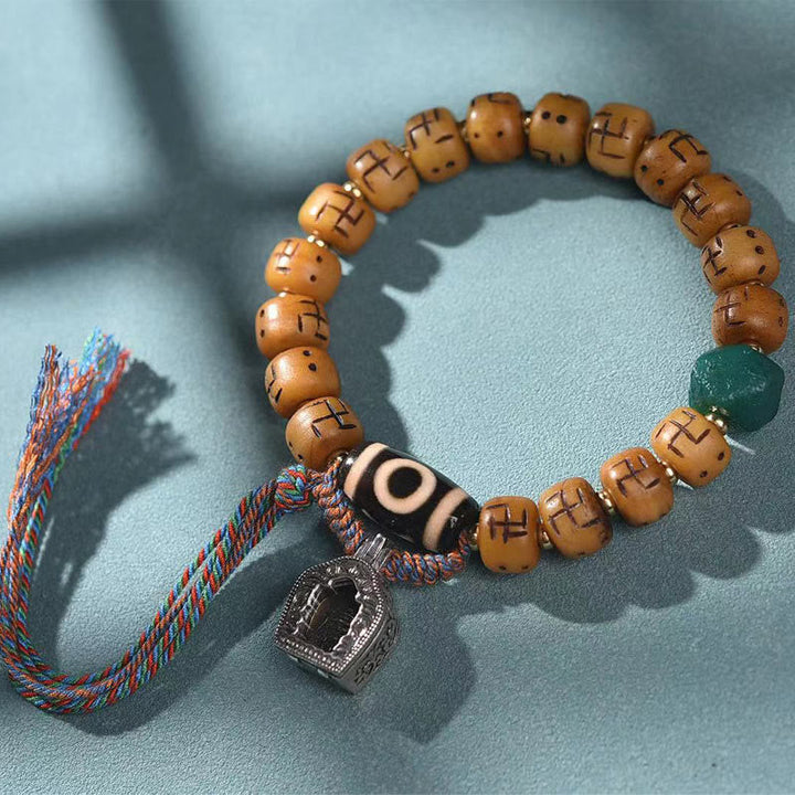 BWOOOH Natural Tibetan Camel Bone Swastika Dzi Bead Shankha Buddha Charm Kirtimukha Luck Protection Tassel Bracelet